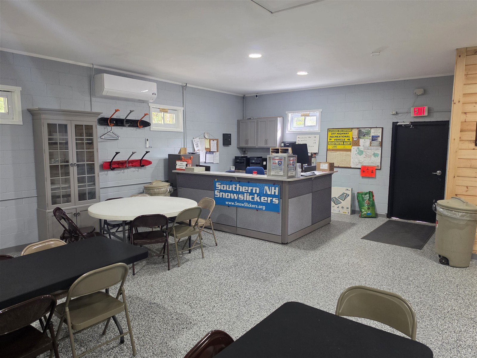 Club desk and seating area beside the renovated gathering room.